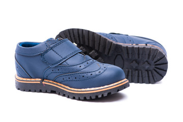 Blue baby shoes isolated on white background