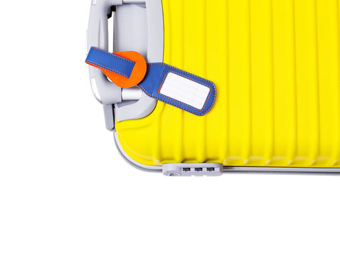 Lost And Found Baggage Concept. Isolated Yellow Suitcase With Empty Tag For Personal Contact Information