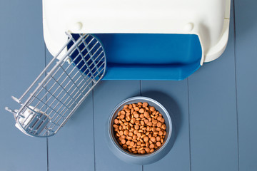 Plastic carrier and food bowl for dogs and cats. Diet and proper nutrition of Pets concept