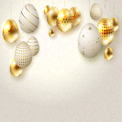 Easter light composition with eggs on golden colored pendants,