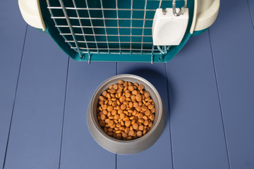 Plastic carrier and food bowl for dogs and cats. Diet and proper nutrition of Pets concept