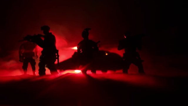 Artwork decoration. Soldiers in the desert during the military operation with combat helicopter or Helicopter assault special forces. Selective focus