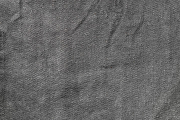 texture of dark gray cotton fabric close-up patterned texture for the background