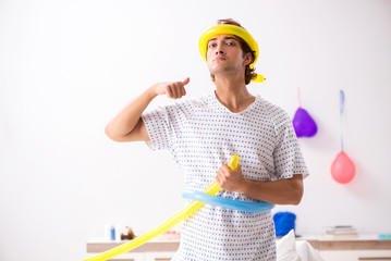 Young man celebrating his birthday in hospital