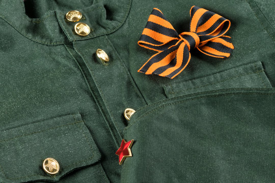 military uniform with a bow of orange-black St. George ribbon