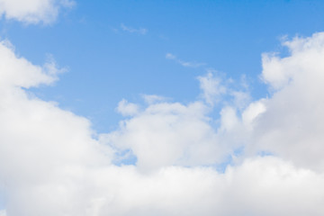 Blue sky background with clouds. White clouds on blue sky