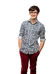 Teenager man with flower shirt and glasses laughing looking to the front over isolated white background