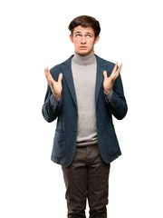 Fototapeta premium Teenager man with turtleneck frustrated by a bad situation over isolated white background