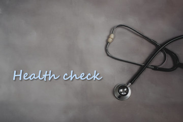 Fototapeta na wymiar Health check text stethoscope, health and medical concept.