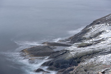 Rocks falling into the sea. Hamnoy, Lofoten islands, Norway