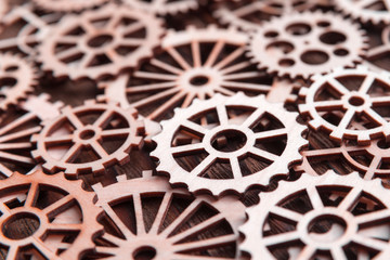 Texture of wooden gears on wooden background. mechanism.