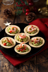 Shrimp and salmon appetizers with avocado cream