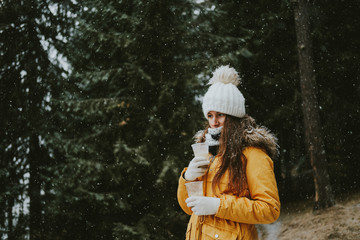 little girl in winter forest