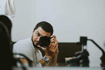 young man with camera
