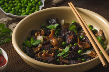 Homemade thai meat with forest mushrooms