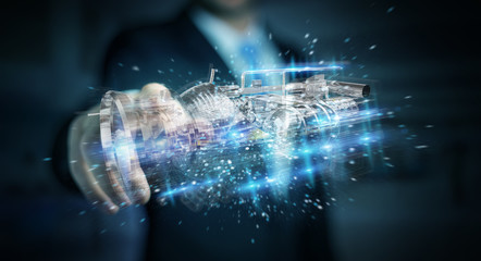Businessman using wireframe holographic 3D digital projection of an engine