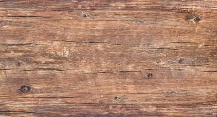 Wood texture background., rough rustic wooden table with cracks and knots. Brown vintage wood for...