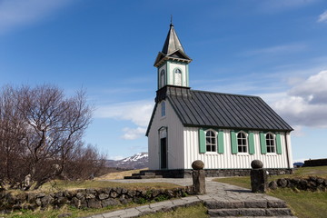 Fototapeta na wymiar Thingvallakirkja Church in the valley of Thingvellir National Park in Iceland's Golden Circle during a beautiful sunny spring day