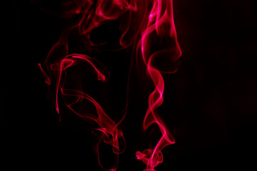 Obraz premium Red Smoke on Black background.