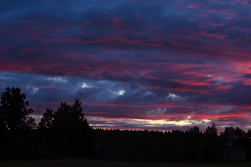 Vivid clouds at dawn before sunrise