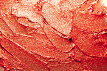 Glitter lipstick smeard background classic red