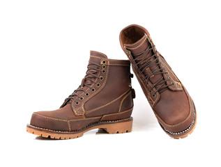 Brown boot with Nubuck leather isolated on a white background.