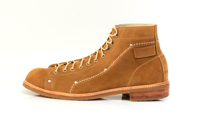 Men’s brown  boot with nubuck leather for man collection isolated on a white background.