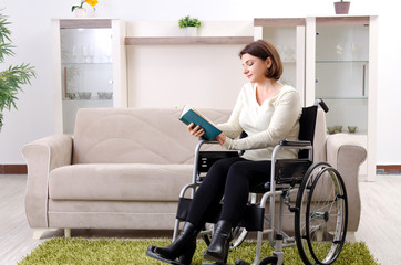 Woman in wheelchair at home 
