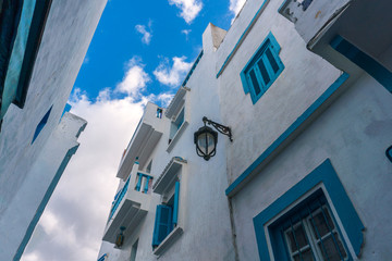 Fototapeta na wymiar Blue and white Street of Asilah in Morocco