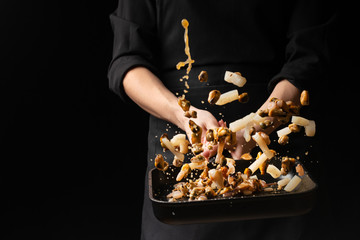 Professional chef prepares seafood. octopus kalmar mussels. Sea food. Asian and Eastern cuisine. culinary background © Anton