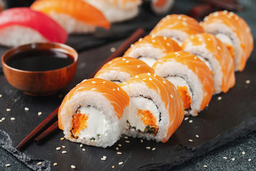 Philadelphia roll sushi with salmon and cucumber.