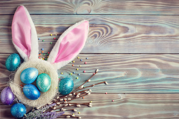 Happy Easter. Congratulatory easter background. Background with copy space. Selective focus. Top view. Horizontal.