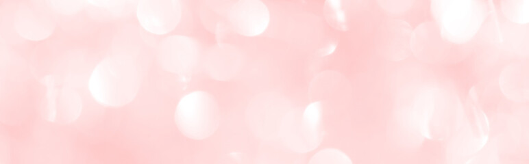 A shiny pink New Year's background for a holiday card. A wallpaper with a blurry pattern.