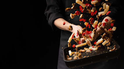 Professional chef prepares seafood with hot chili peppers. octopus kalmar mussels. Sea food. Asian and Oriental cuisine, Mexican spicy. Culinary background. Freezing food © Anton