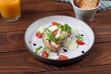 Appetizer of eggplant, Kalamata olives, green onions and cottage cheese. Mediterranean snack. Vegan health food