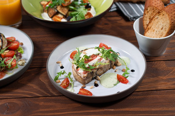 Appetizer of eggplant, Kalamata olives, green onions and cottage cheese. Mediterranean snack. Vegan health food