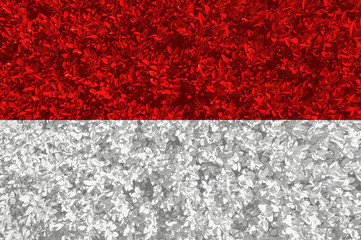 Monaco flag with texture of leaves and bushes. Background wallpaper for installation and design. Space for text.