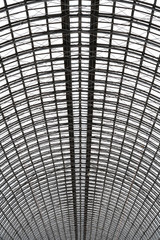 Perspective view to hemispherical ceiling of glass and metal in modern building as background, texture, abstract (vertical orientation)
