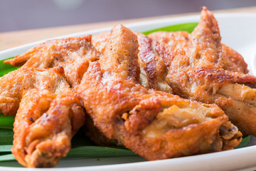 brown skin deep fried chicken wings.