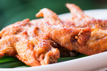 brown skin deep fried chicken wings.