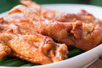 brown skin deep fried chicken wings.
