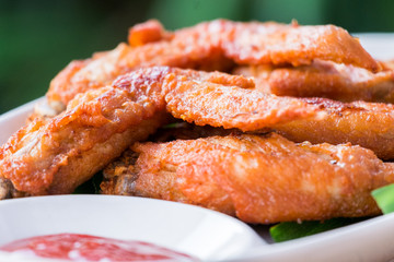 brown skin deep fried chicken wings.