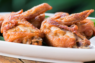 brown skin deep fried chicken wings.