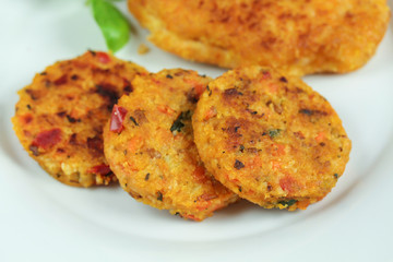 escalope panée et palets de légumes