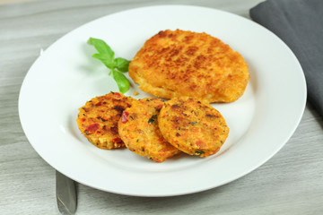 escalope panée et palets de légumes