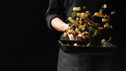Professional chef prepares seafood with greens. octopus kalmar mussels. Sea food. Asian and Eastern cuisine. culinary background. Food freeze. Menu © Anton