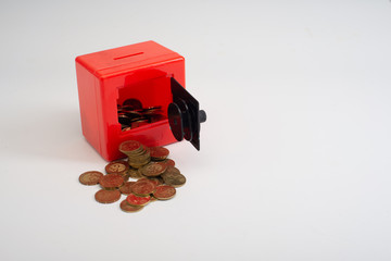 box with coins isolated on white background