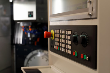 CNC machining center with a control panel