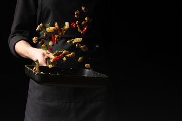 Professional chef prepares seafood with spicy chili peppers and greens. octopus kalmar mussels. Sea food. Asian and Oriental cuisine, Mexican spicy. Culinary background. Freezing food © Anton