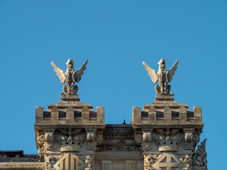 Obraz premium Statue of monster above the Agencia Estatal de Administración Tributaria (AEAT), commonly known as Agencia Tributaria is the revenue service of the Kingdom of Spain.